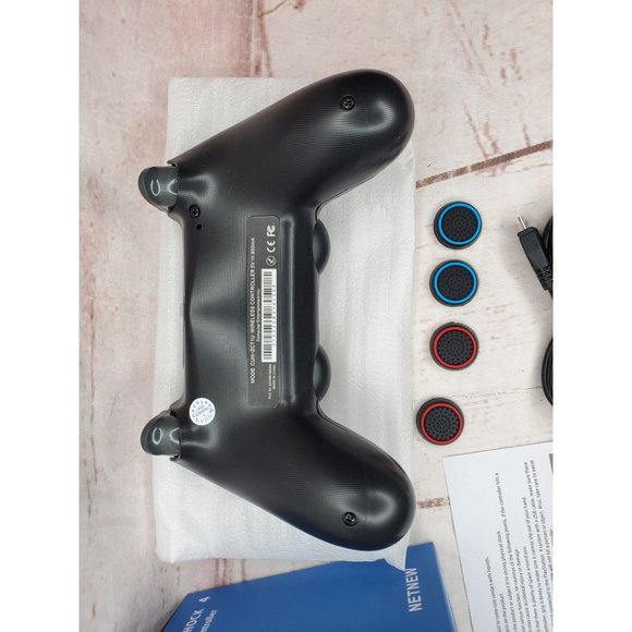 Black Wireless Controller With 4 Extra Grips And Charger Cord - Picture 7 of 8